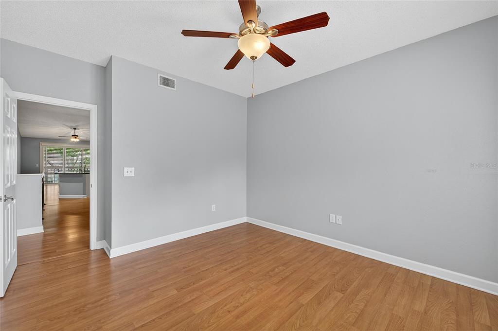 820 Normandy Trace Road Tampa, FL 33602 - Photo 34 of 49 wooden floor in an empty room