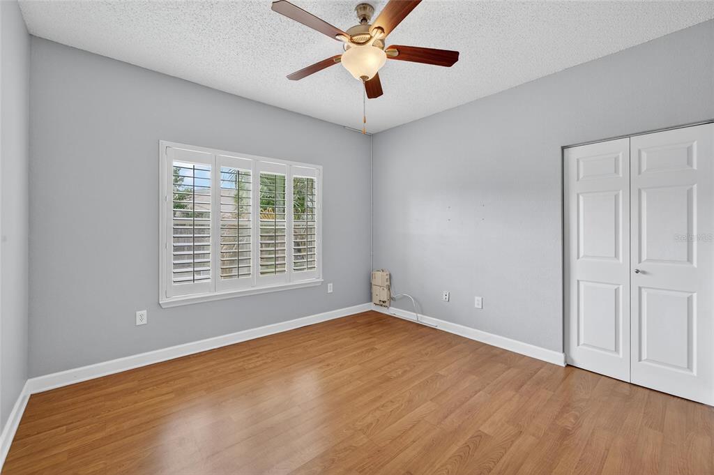 820 Normandy Trace Road Tampa, FL 33602 - Photo 35 of 49 a view of an empty room with window and a kitchen