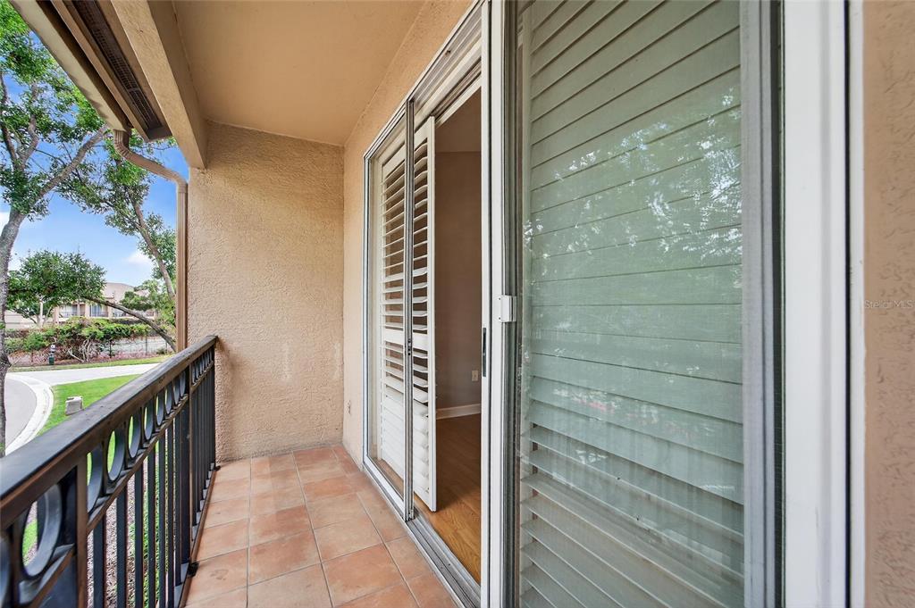 820 Normandy Trace Road Tampa, FL 33602 - Photo 39 of 49 a view of balcony with wooden floor