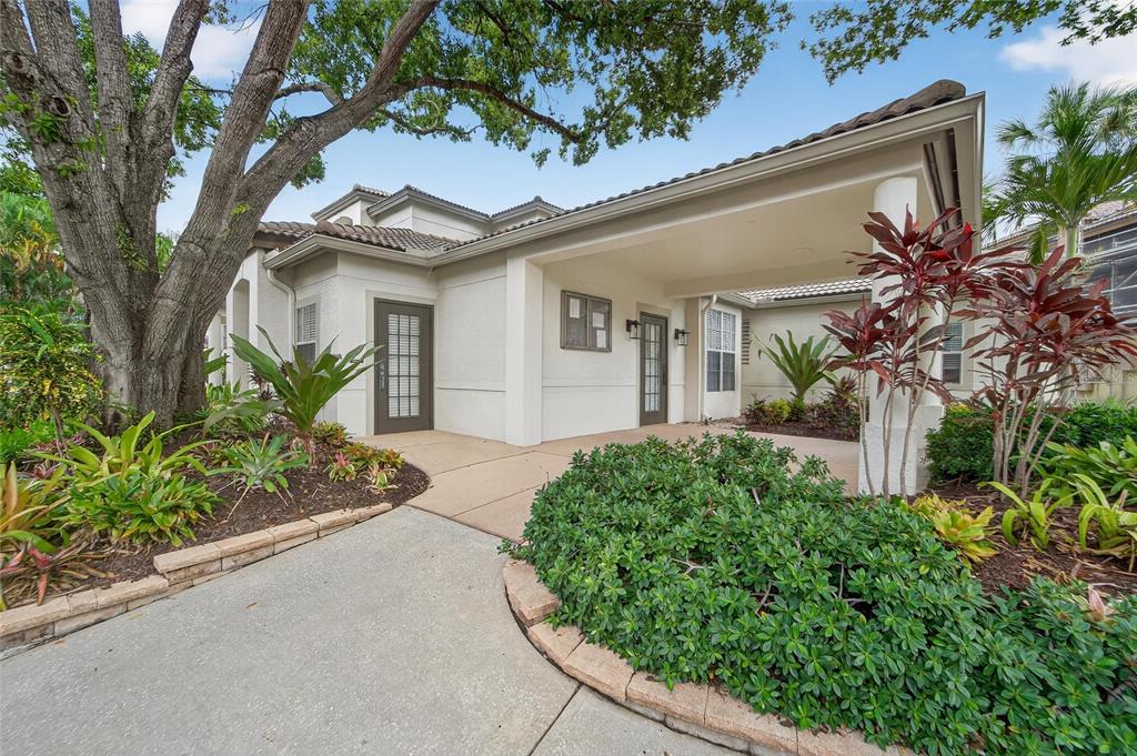 820 Normandy Trace Road Tampa, FL 33602 - Photo 43 of 49 a front view of a house with a yard
