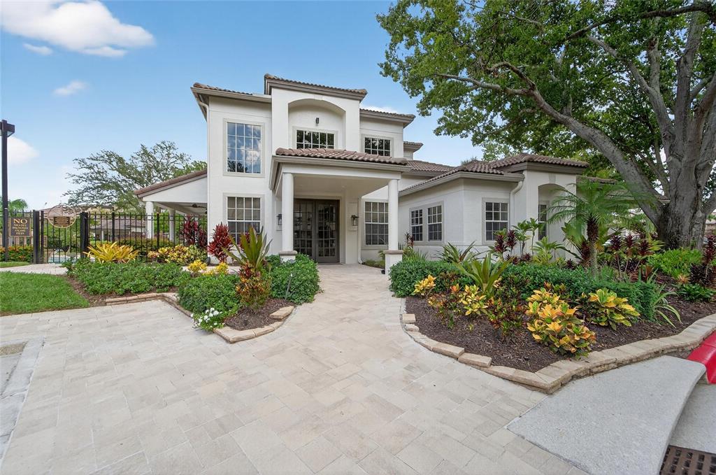 820 Normandy Trace Road Tampa, FL 33602 - Photo 44 of 49 front view of a house with a yard