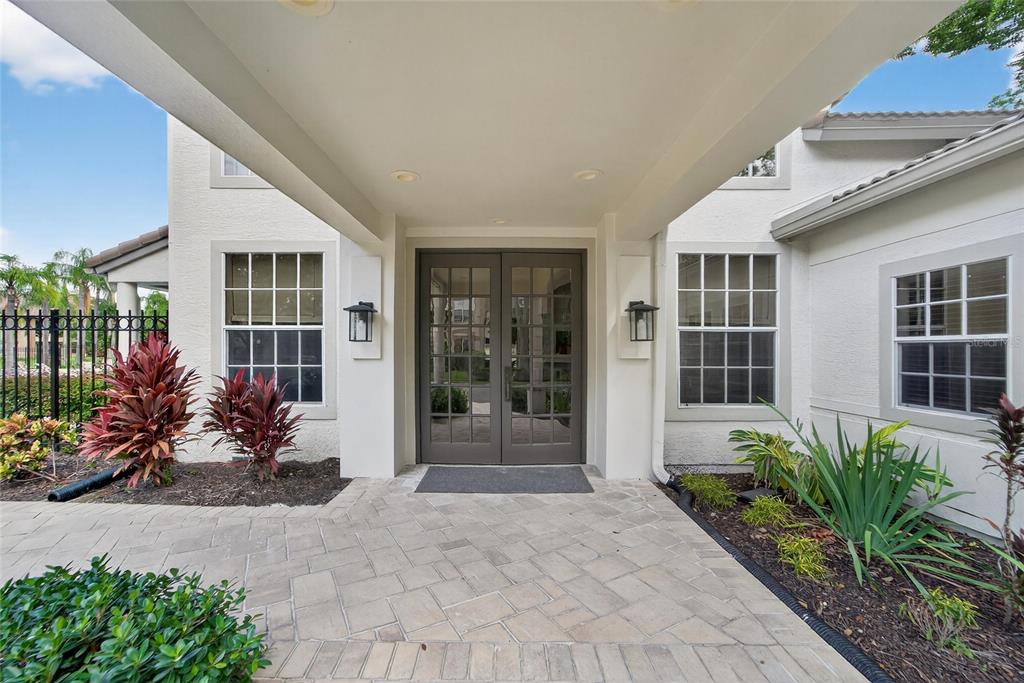 820 Normandy Trace Road Tampa, FL 33602 - Photo 45 of 49 a front view of a house with a garden