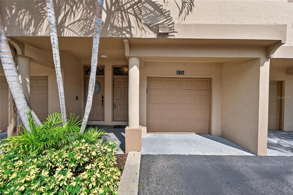 820 Normandy Trace Road Tampa, FL 33602 - Photo 5 of 49 a front view of a house with garden