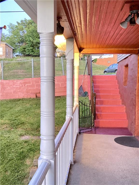 411 Rostraver Street Monessen, PA 15062 - Photo 6 of 26 outside steps coming to the front/side door