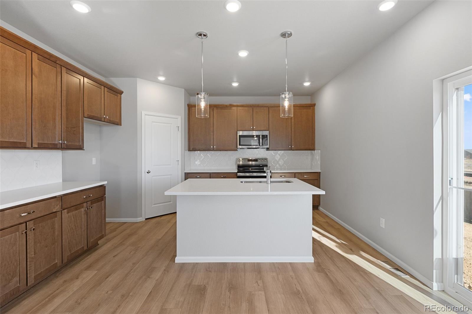 15348 Poplar Street Thornton, CO 80602 - Photo 5 of 32