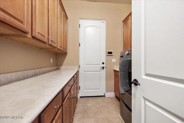 a view of a livingroom with furniture and a window