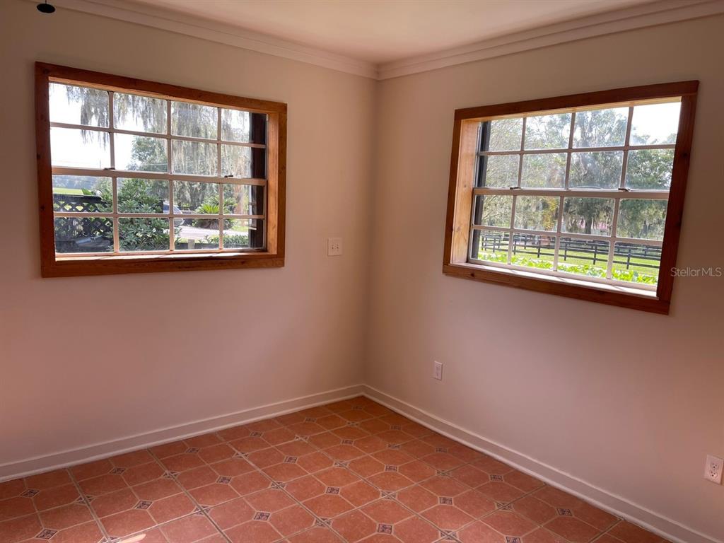 2309 Southwest 66th Street Ocala, FL 34476 - Photo 23 of 35 an empty room with a window