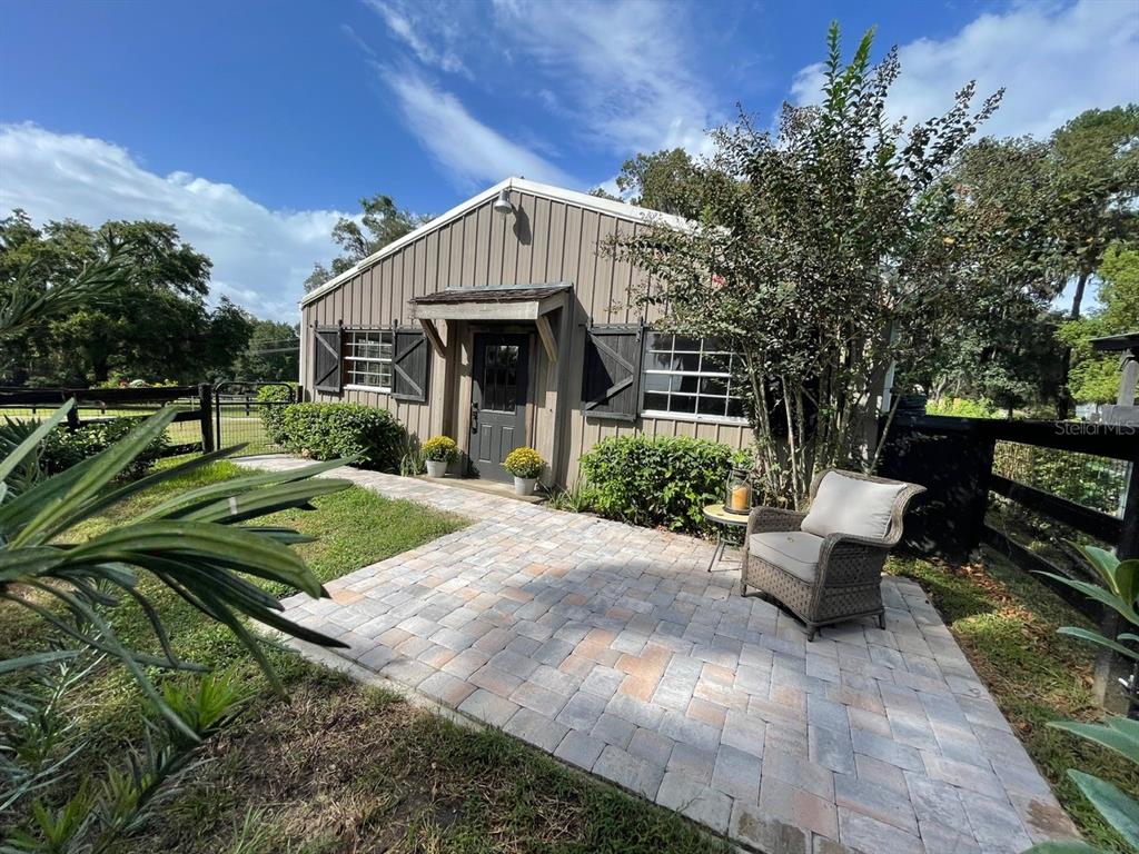 2309 Southwest 66th Street Ocala, FL 34476 - Photo 5 of 35 a view of a house with yard and sitting area