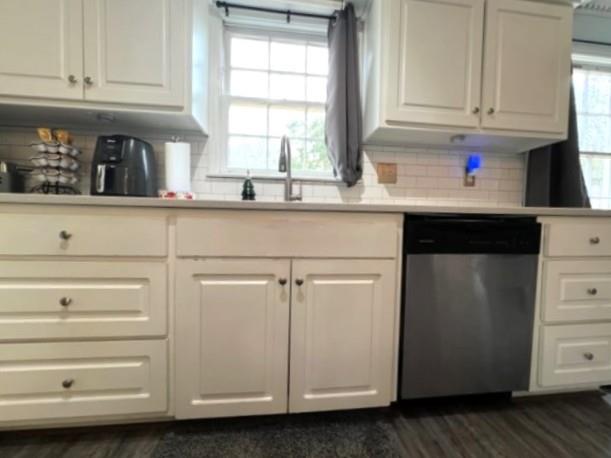 4405 Green Ridge Drive Columbus, GA 31909 - Photo 16 of 31 a kitchen with white cabinets and a window