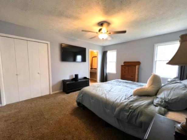 4405 Green Ridge Drive Columbus, GA 31909 - Photo 20 of 31 a bedroom with a bed and a flat screen tv