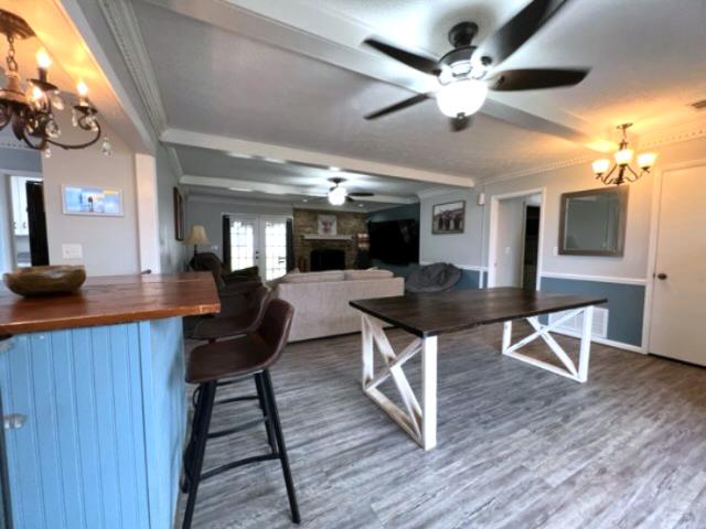 4405 Green Ridge Drive Columbus, GA 31909 - Photo 7 of 31 a view of a dining room with furniture and wooden floor