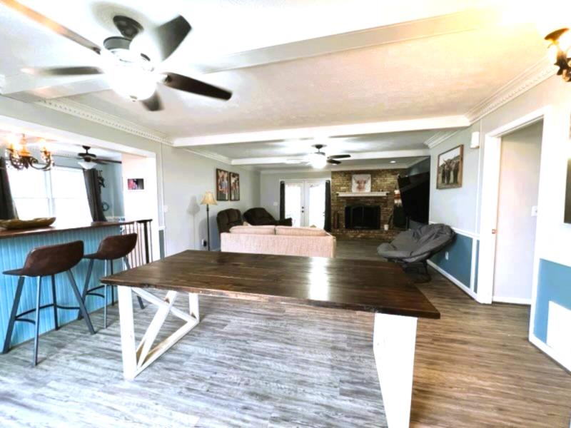 4405 Green Ridge Drive Columbus, GA 31909 - Photo 8 of 31 a view of a living room kitchen and a wooden floor