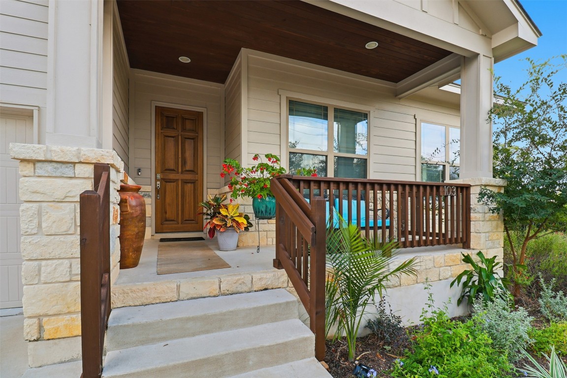 103 Kings Way Horseshoe Bay, TX 78657 - Photo 2 of 20 a view of a porch with wooden floor and fence