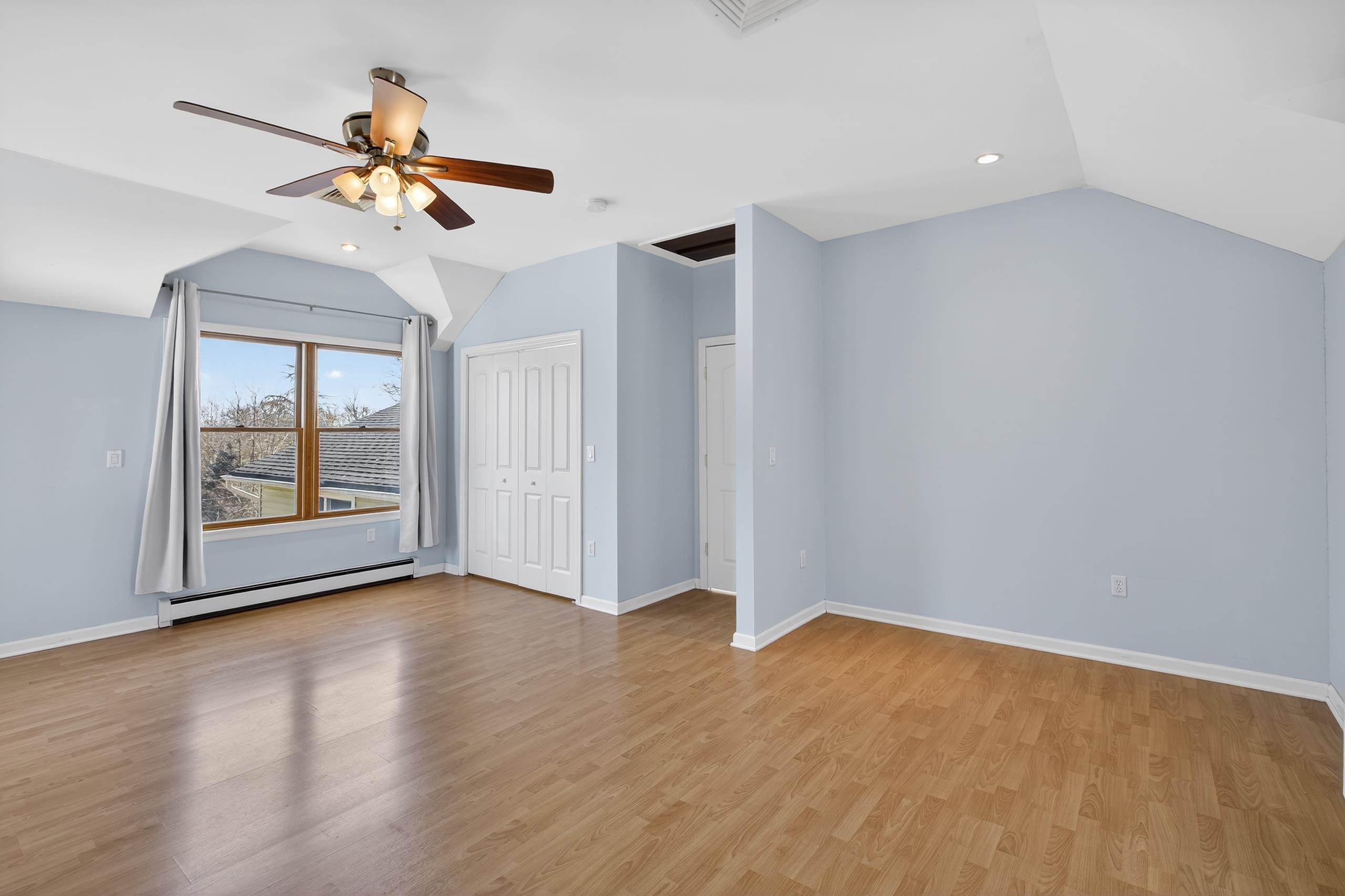 33 Georgia Drive Wayne, NJ 07470 - Photo 18 of 36 a view of an empty room with a window