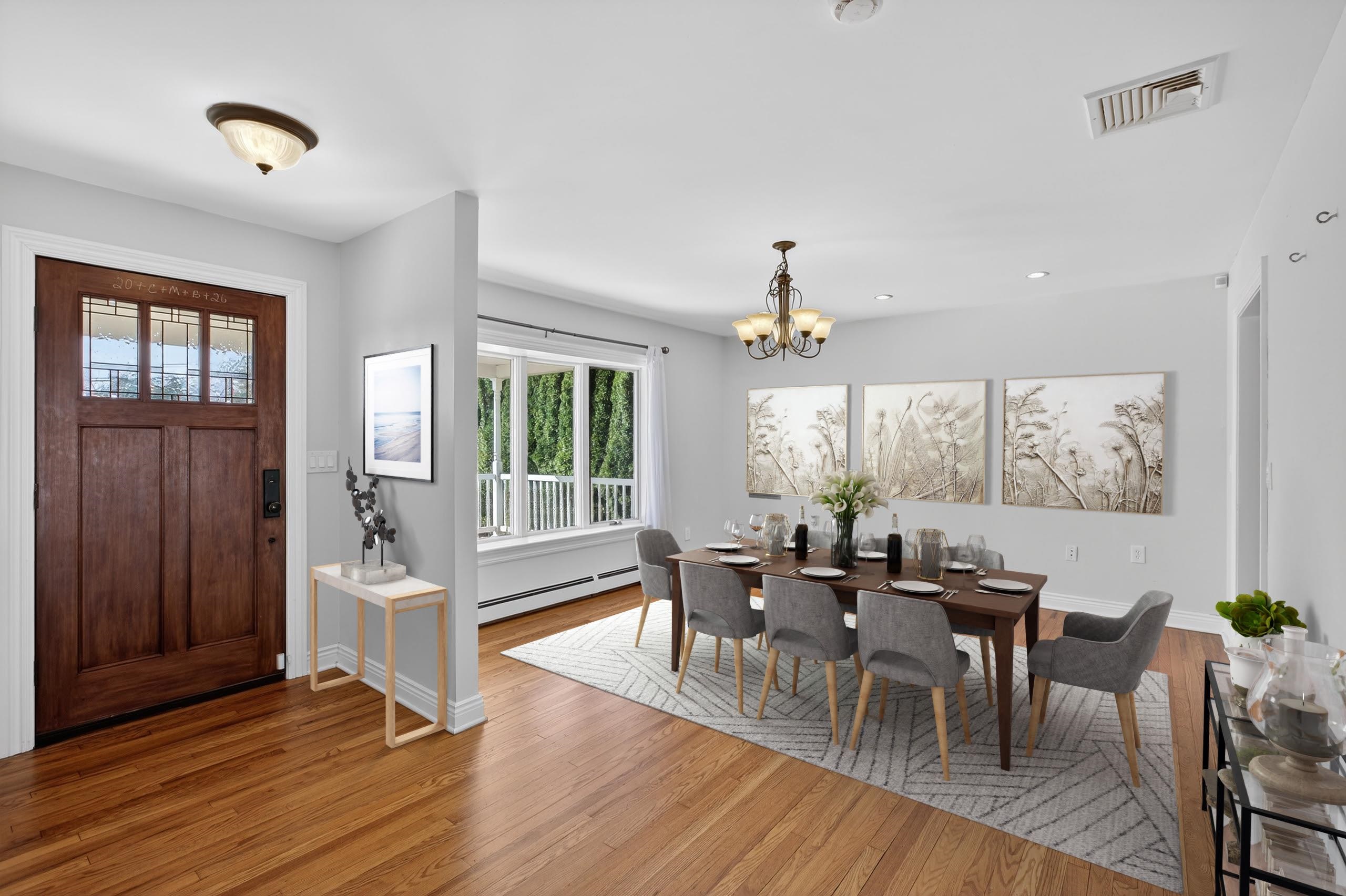 33 Georgia Drive Wayne, NJ 07470 - Photo 2 of 36 a view of a dining room with furniture window and wooden floor