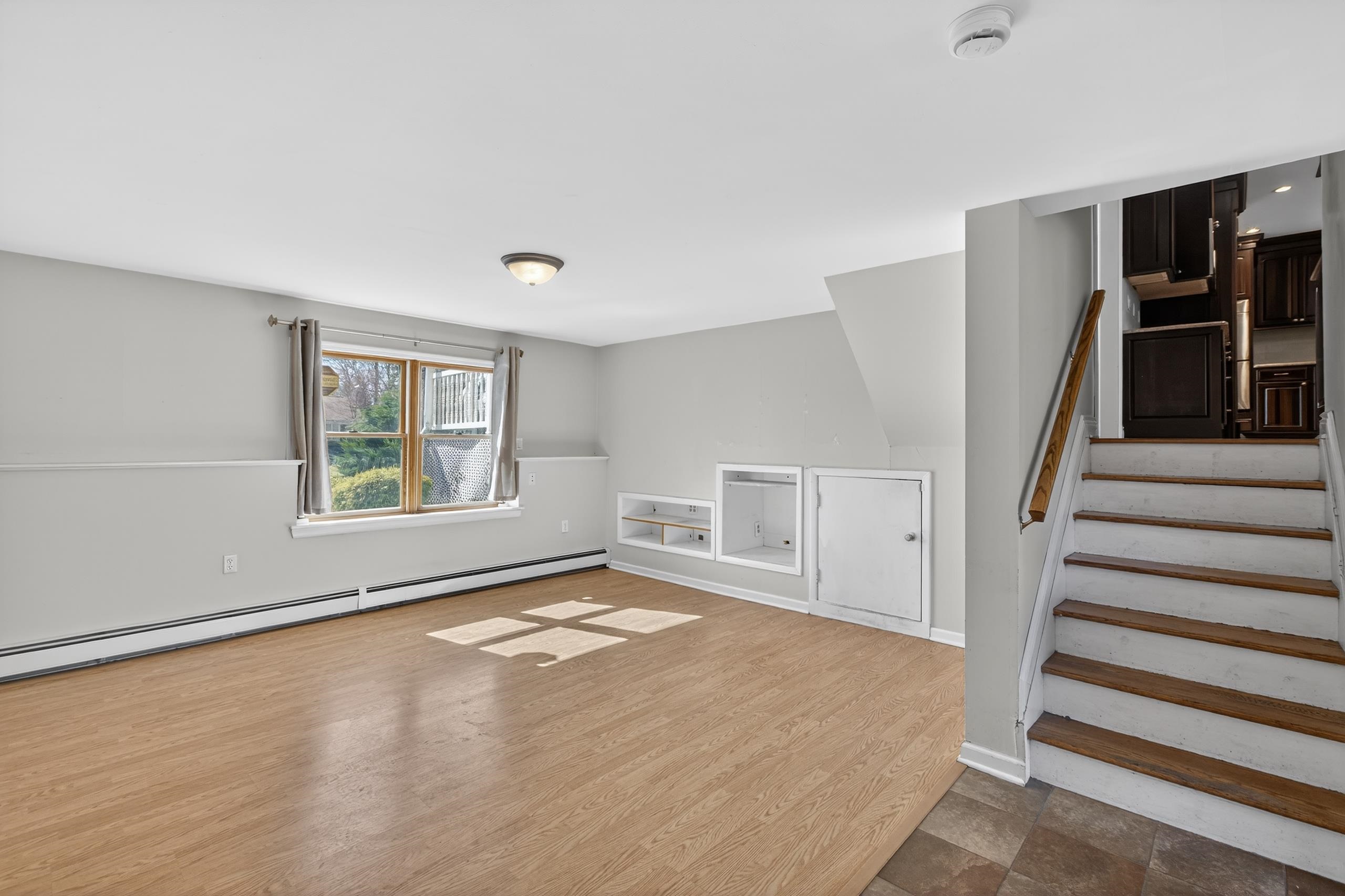 33 Georgia Drive Wayne, NJ 07470 - Photo 23 of 36 a view of an empty room with a window