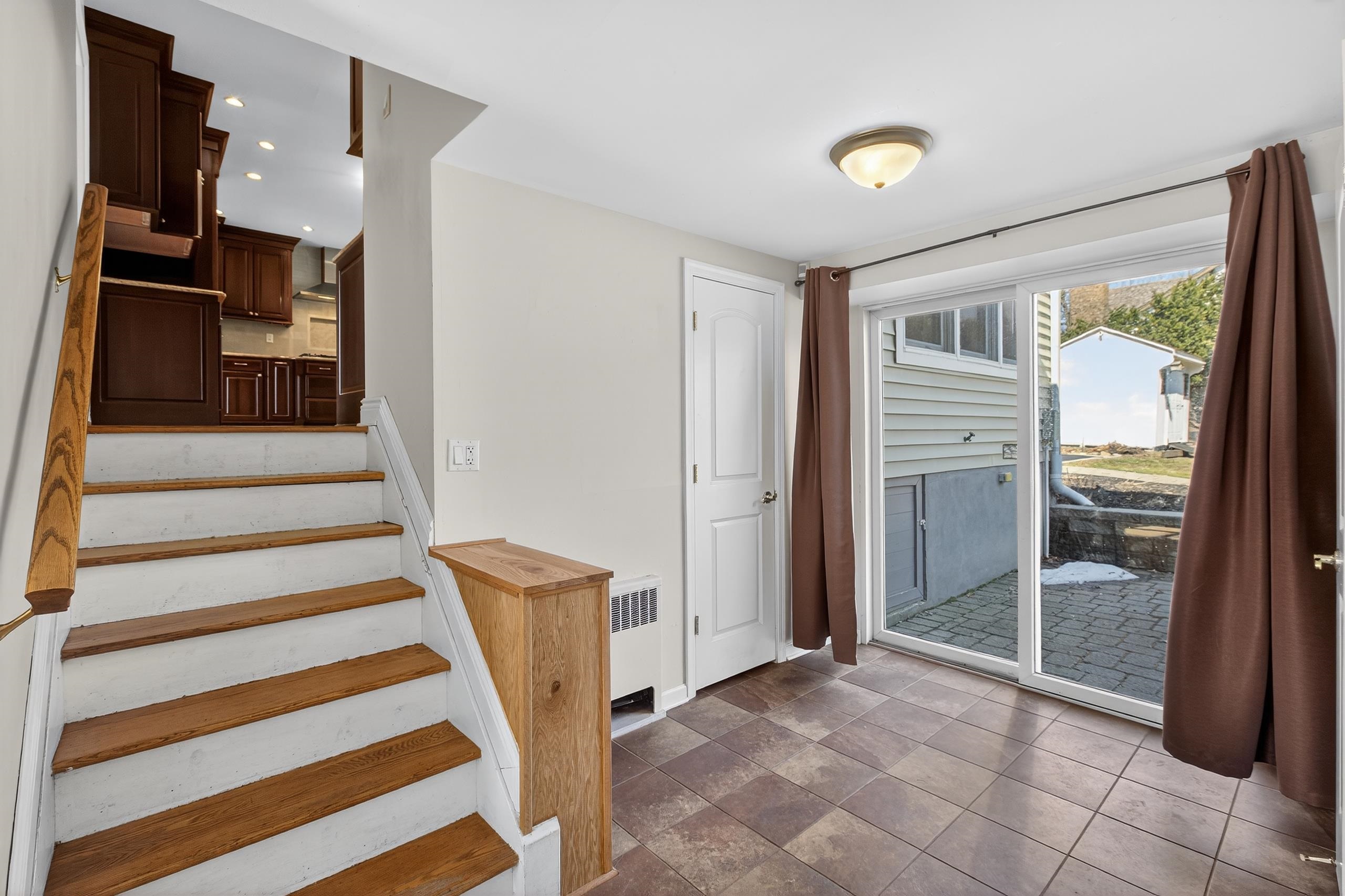 33 Georgia Drive Wayne, NJ 07470 - Photo 25 of 36 a view of a hallway with entryway and staircase