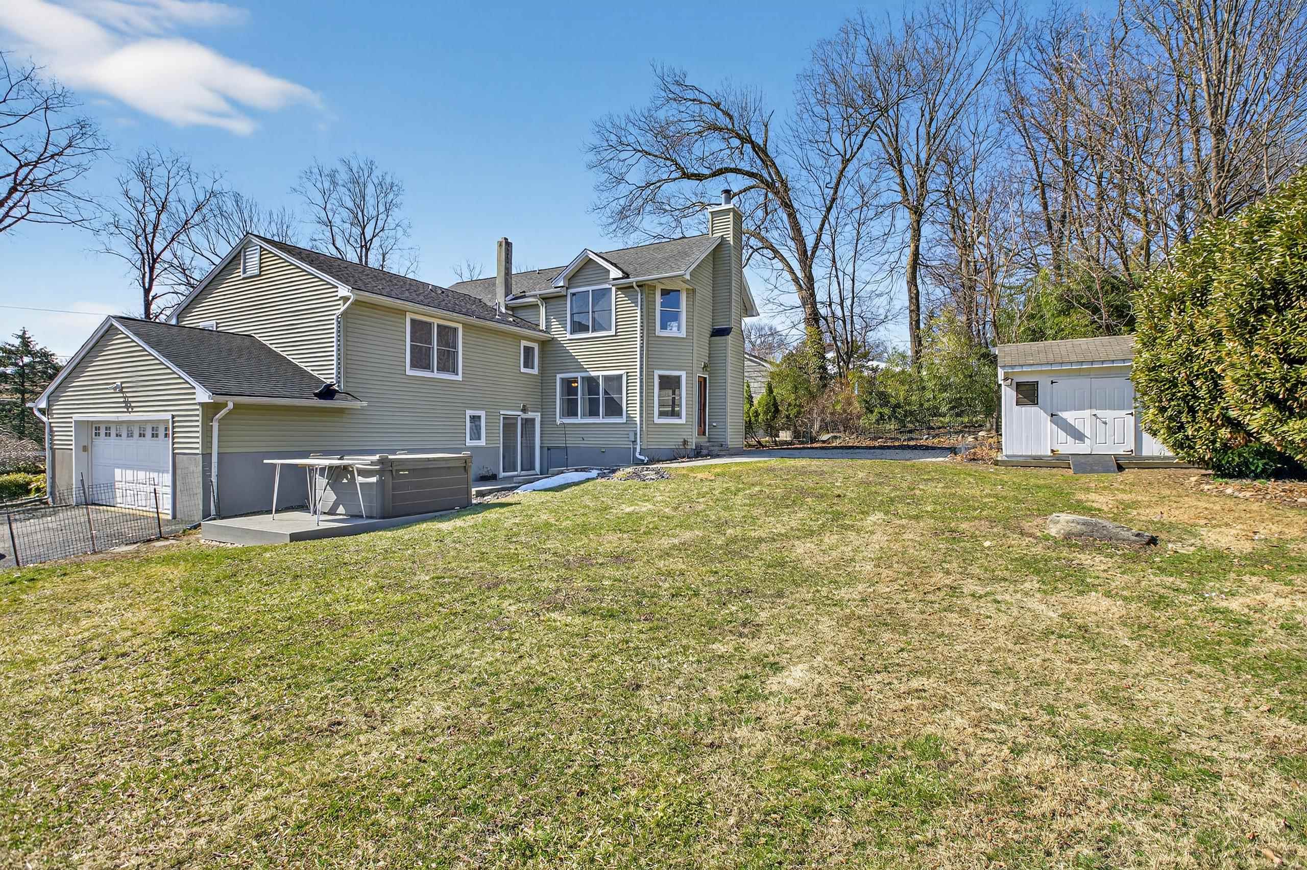 33 Georgia Drive Wayne, NJ 07470 - Photo 29 of 36 a front view of a house with a yard