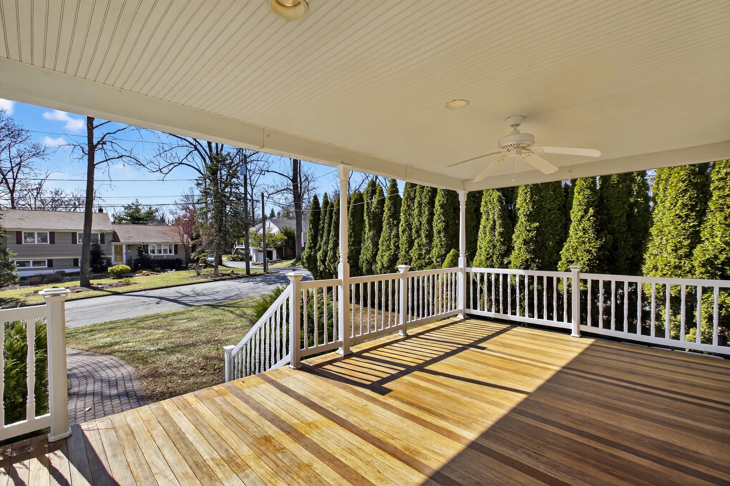 33 Georgia Drive Wayne, NJ 07470 - Photo 34 of 36 a view of balcony with wooden floor and outdoor seating