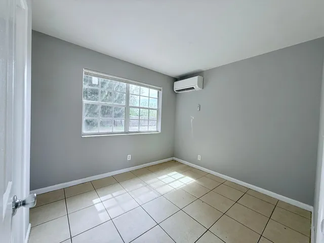 a view of an empty room with window