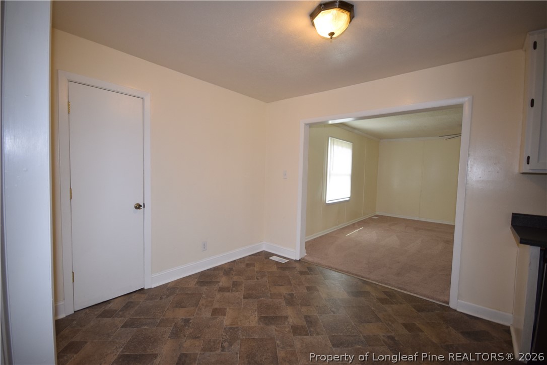 108 South 6th Street Spring Lake, NC 28390 - Photo 8 of 20 a view of an empty room and window