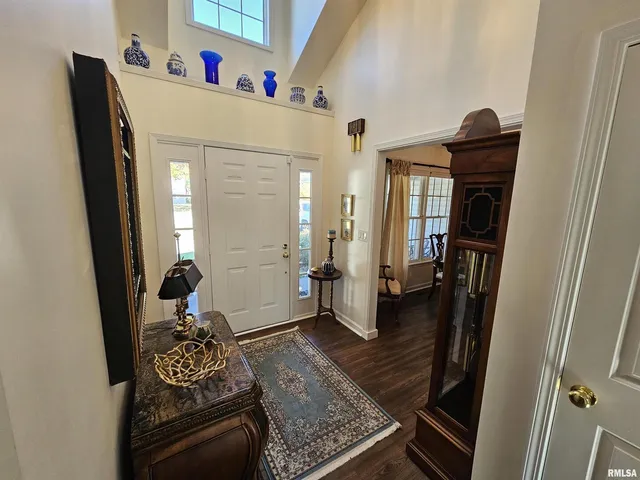 a living room with furniture and a gate