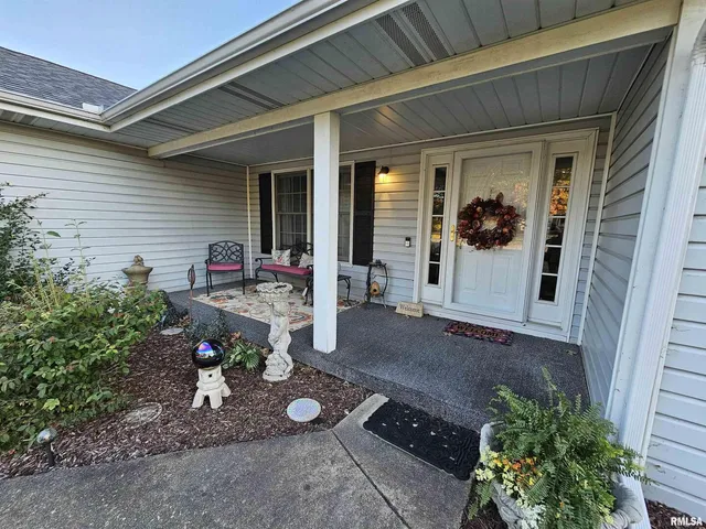 a front view of a house with patio