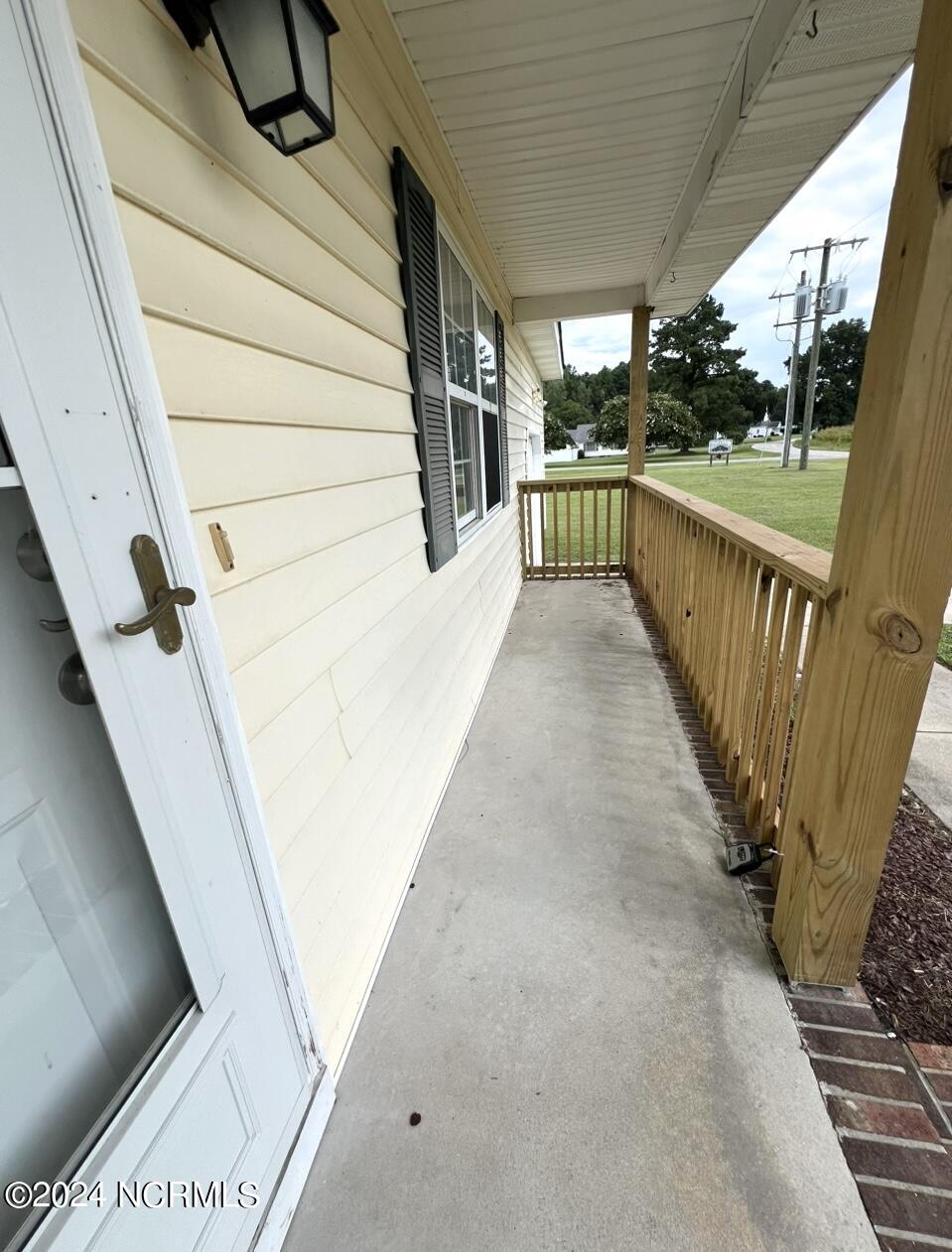 318 Maple Road Currituck, NC 27929 - Photo 4 of 18 covered porch