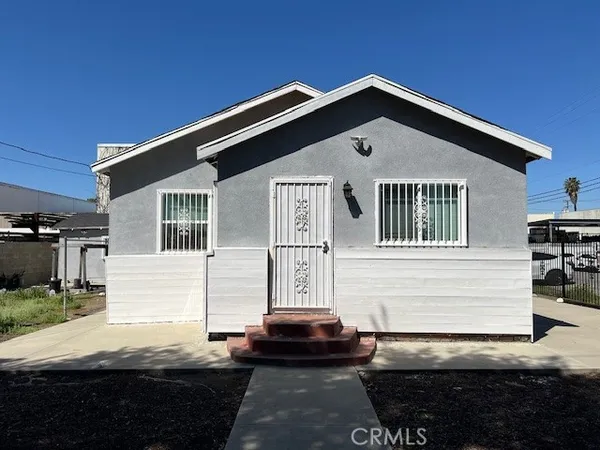 a front view of a house with a garage