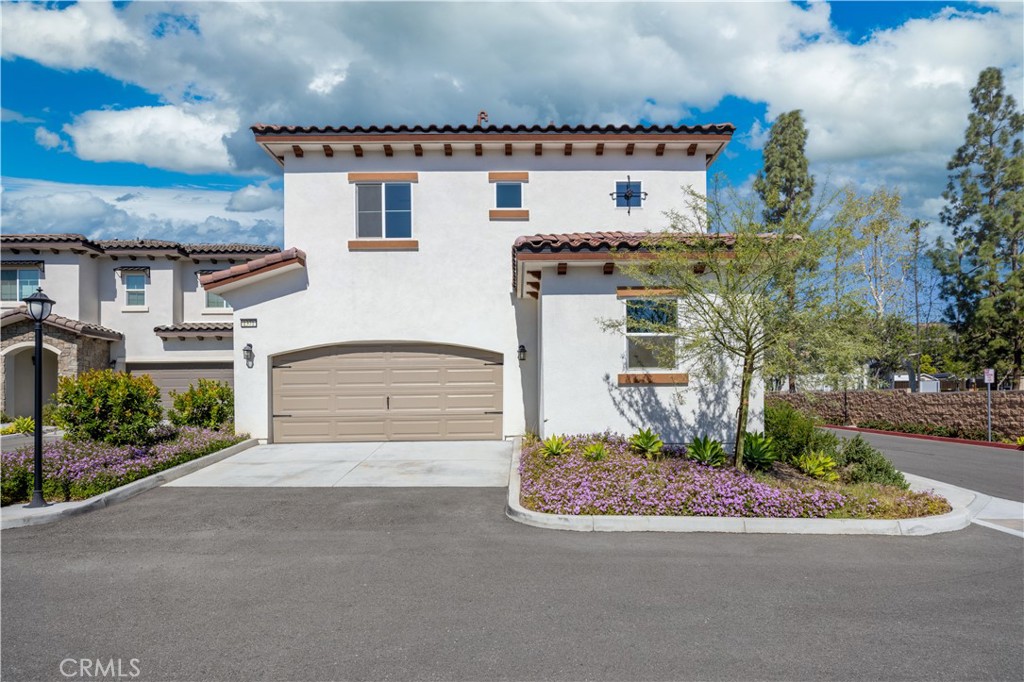 1371 Point Loma Place Walnut, CA 91789 - Photo 12 of 33 front view of a house with a street