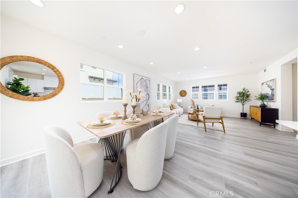 1371 Point Loma Place Walnut, CA 91789 - Photo 17 of 33 a living room with furniture a table and kitchen view