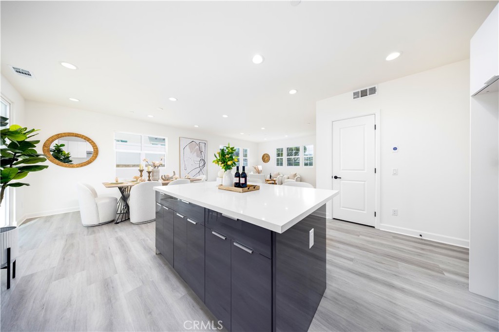 1371 Point Loma Place Walnut, CA 91789 - Photo 19 of 33 a kitchen with a sink a counter top space and stainless steel appliances