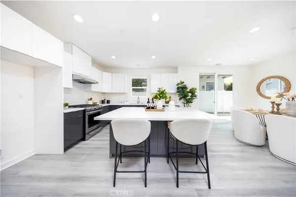 a view of kitchen and utility room