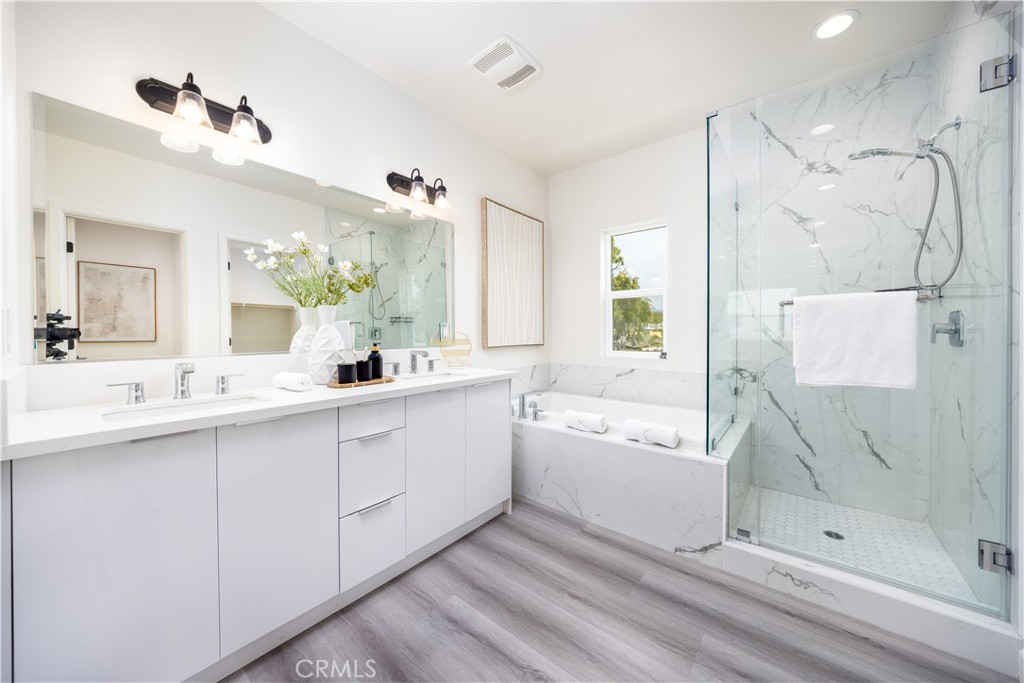 1371 Point Loma Place Walnut, CA 91789 - Photo 28 of 33 a bathroom with a tub sink and mirror