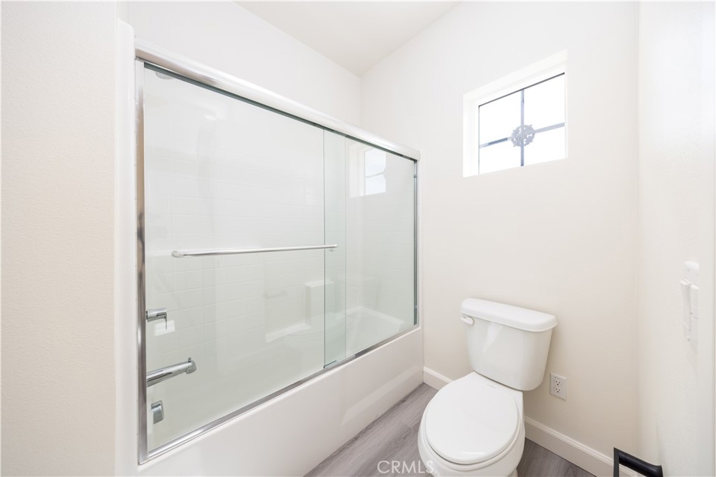 1371 Point Loma Place Walnut, CA 91789 - Photo 31 of 33 a white toilet sitting next to a bath tub