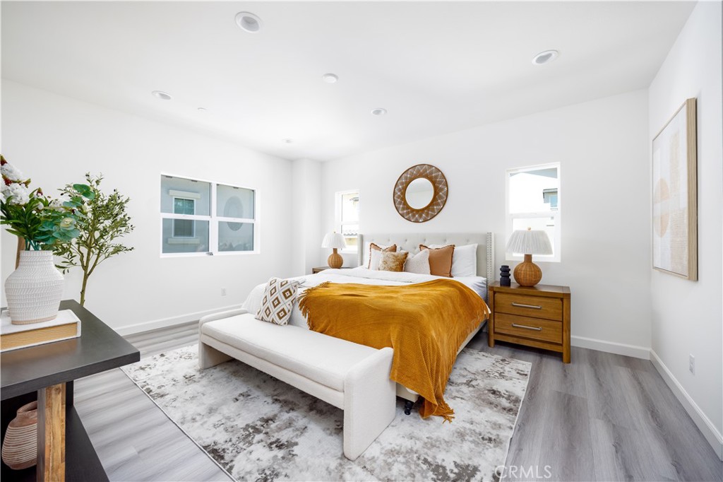 1371 Point Loma Place Walnut, CA 91789 - Photo 6 of 33 a bedroom with a bed and a potted plant