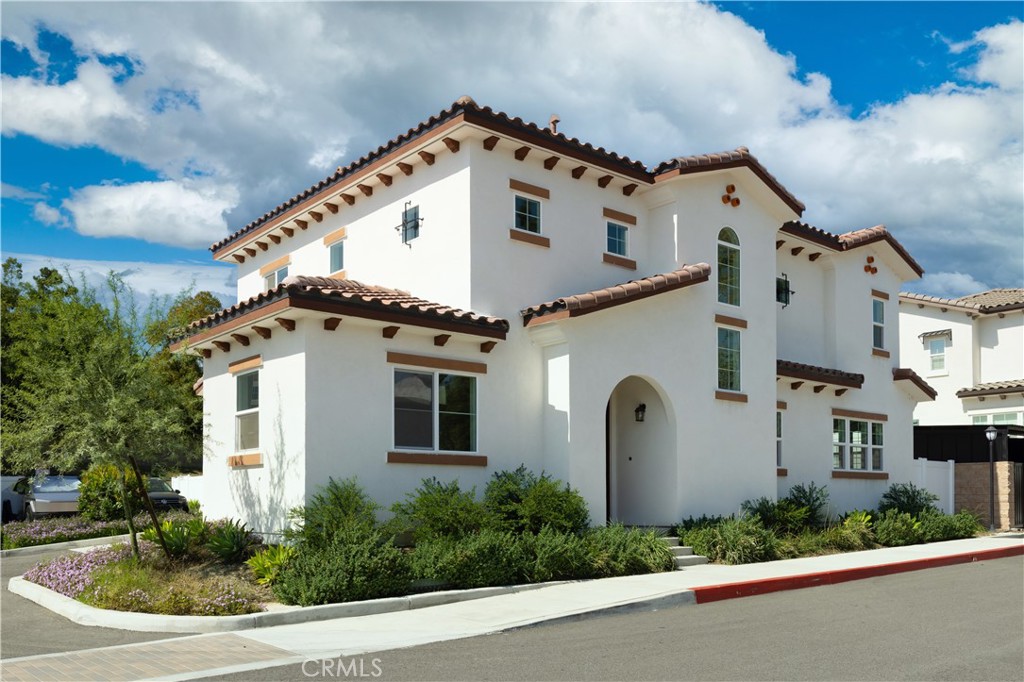 1371 Point Loma Place Walnut, CA 91789 - Photo 7 of 33 a front view of a house with garden