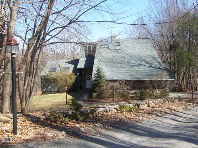 a view of a backyard of the house