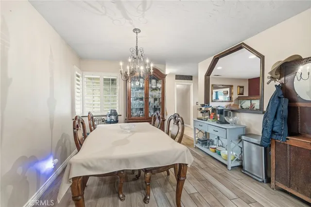 a kitchen with a stove sink and cabinets