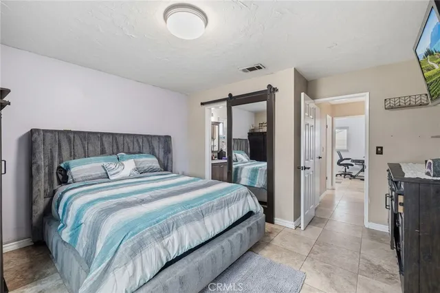 a view of a balcony dining table and chairs
