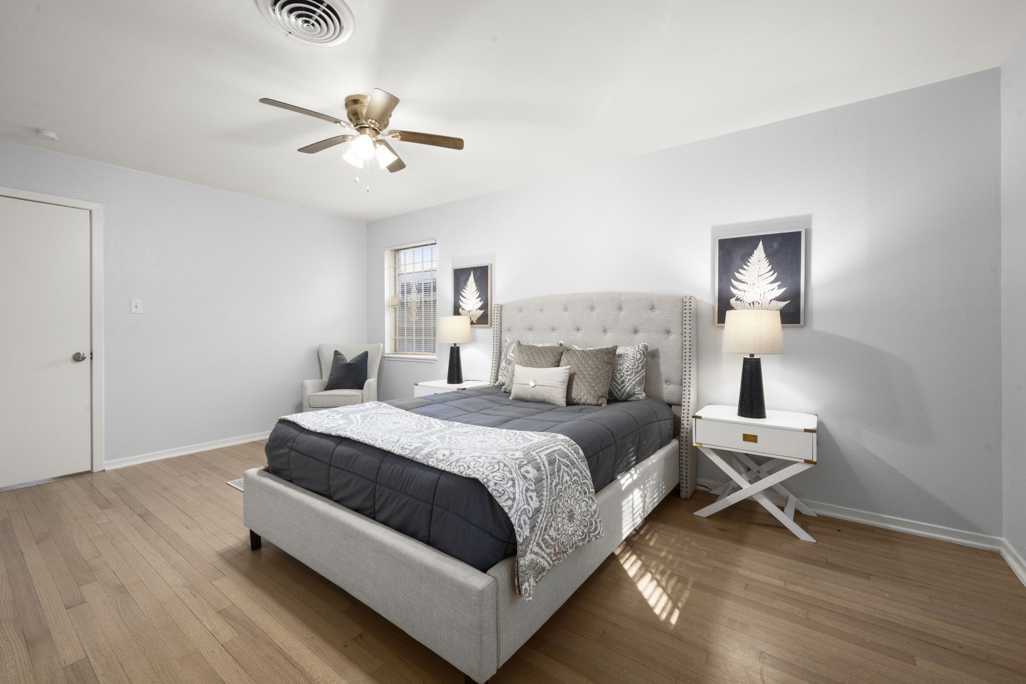 4326 Akard Street Houston, TX 77047 - Photo 24 of 43 a bedroom with a bed and a window