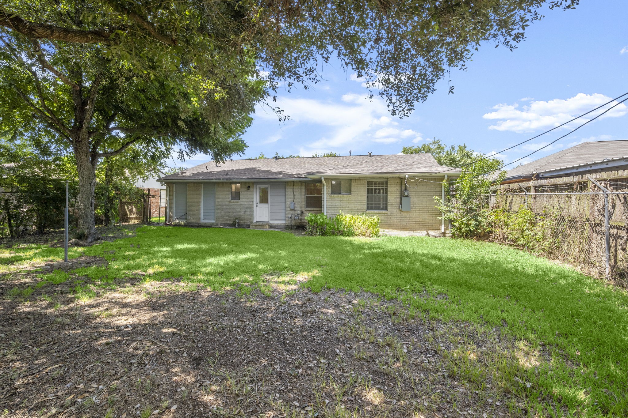 4326 Akard Street Houston, TX 77047 - Photo 38 of 43 a view of front of a house with a yard
