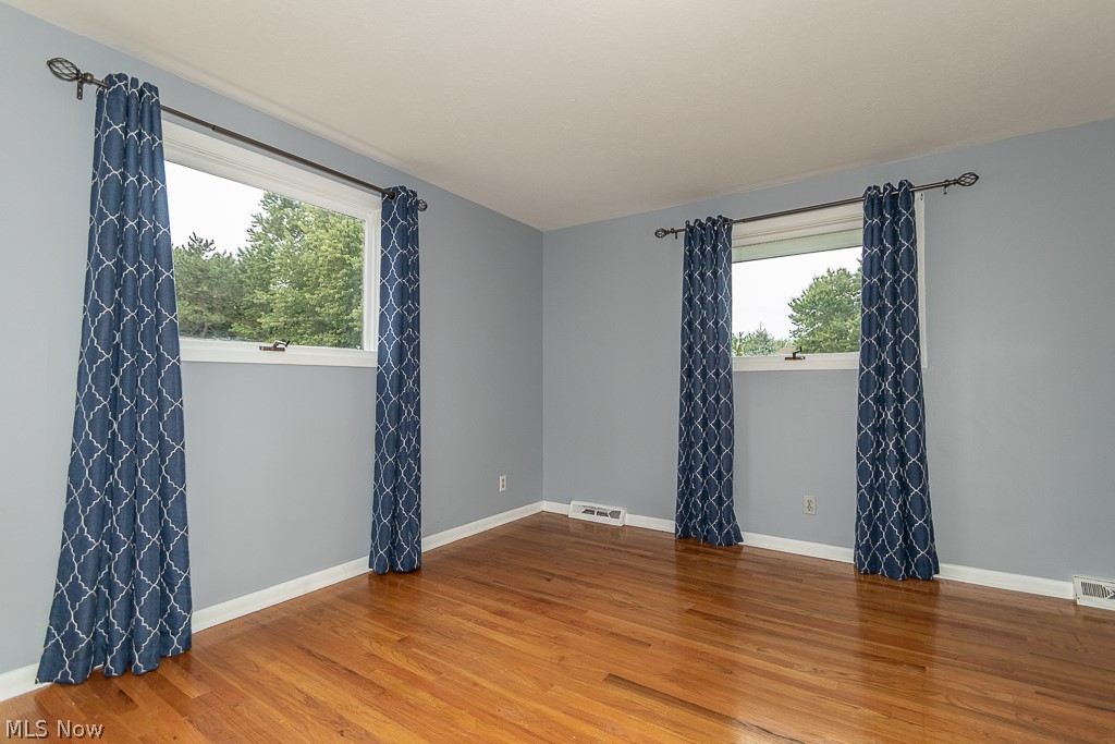 30249 Ridge Road Wickliffe, OH 44092 - Photo 26 of 35 Master bedroom 15x12 with hardwood floor and private bath with shower.