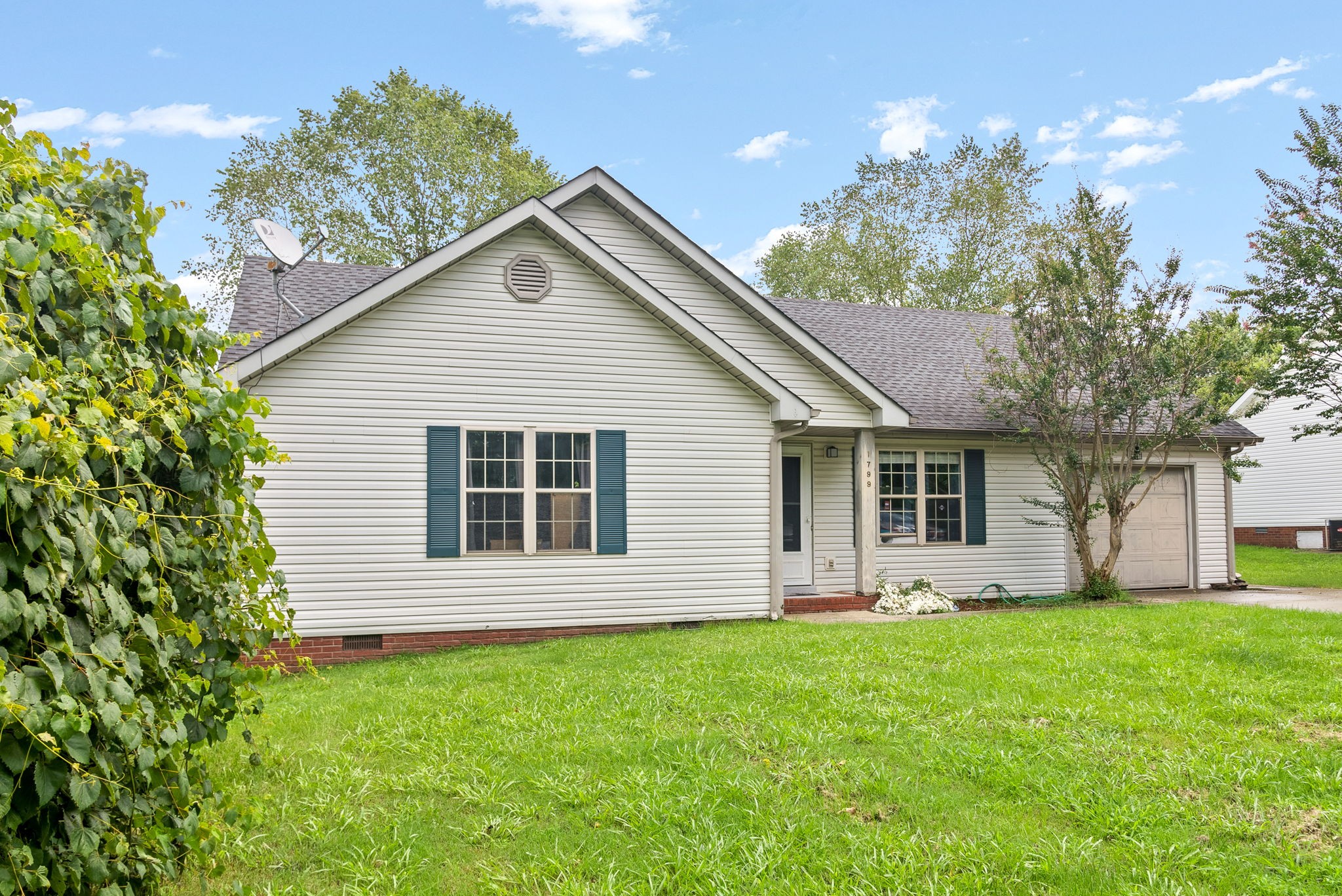 1799 Needmore Road Clarksville, TN 37042 - Photo 2 of 27 a view of a house with a yard