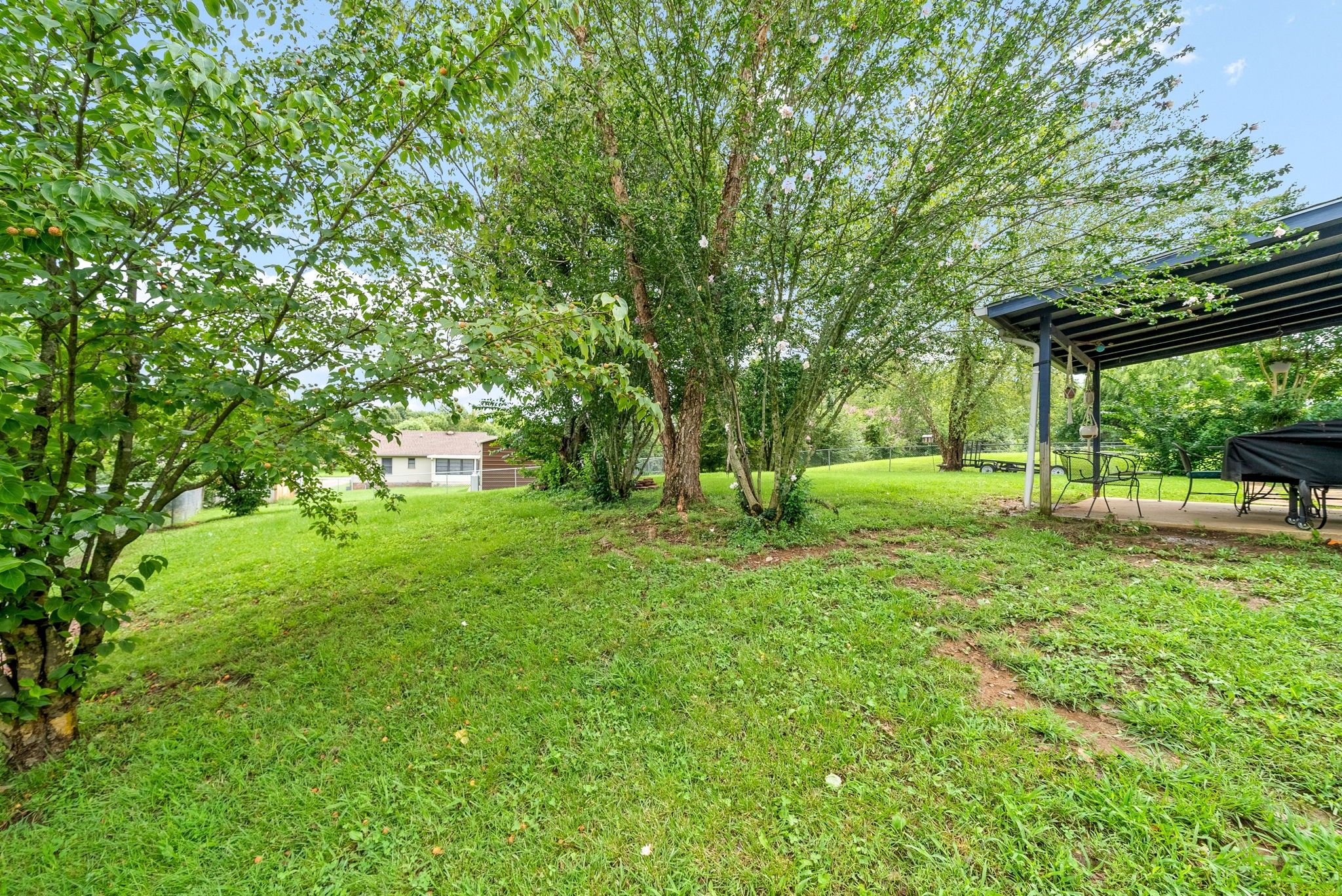 1799 Needmore Road Clarksville, TN 37042 - Photo 27 of 27 a view of green field with trees in the background