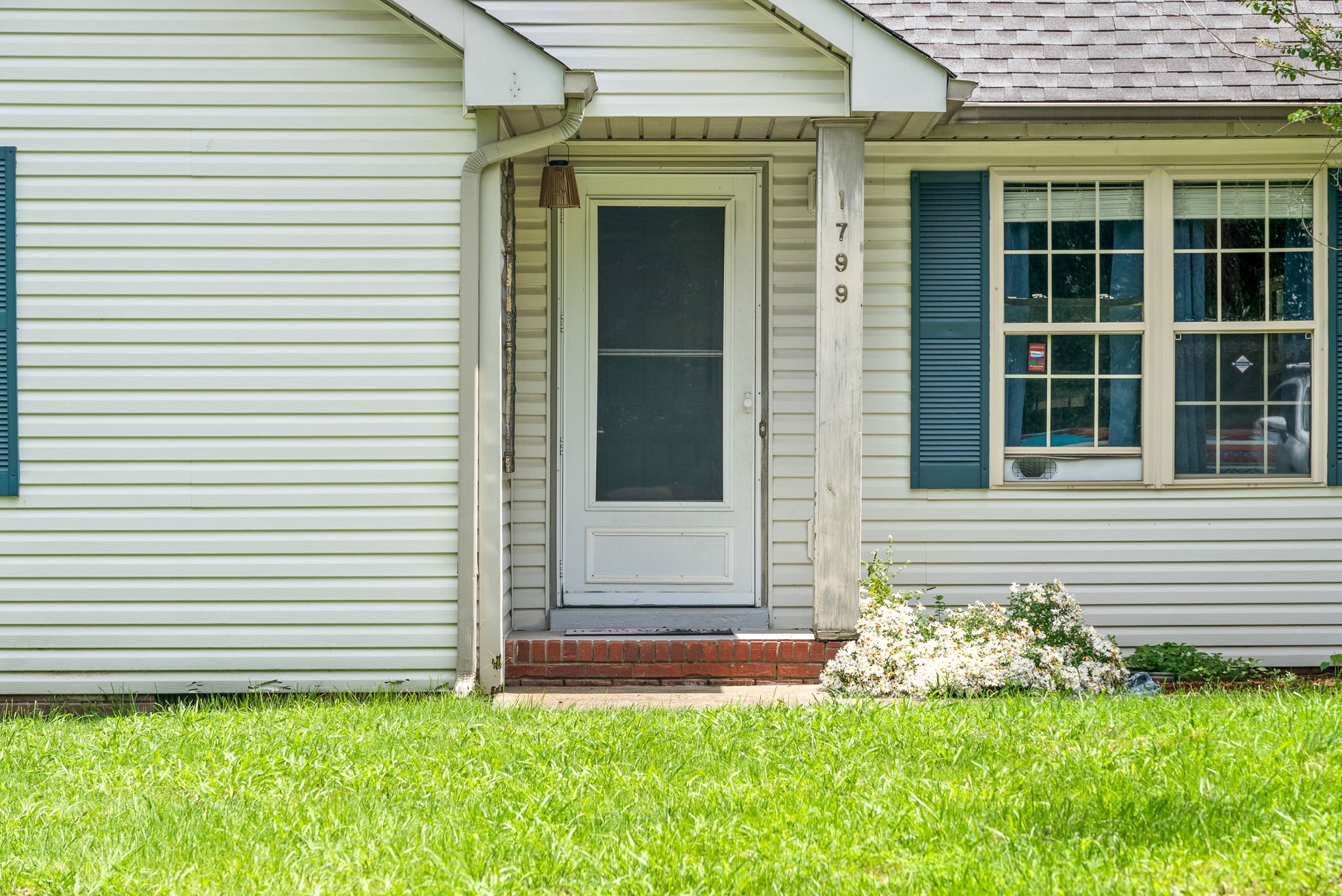 1799 Needmore Road Clarksville, TN 37042 - Photo 3 of 27 a front view of a house with a yard