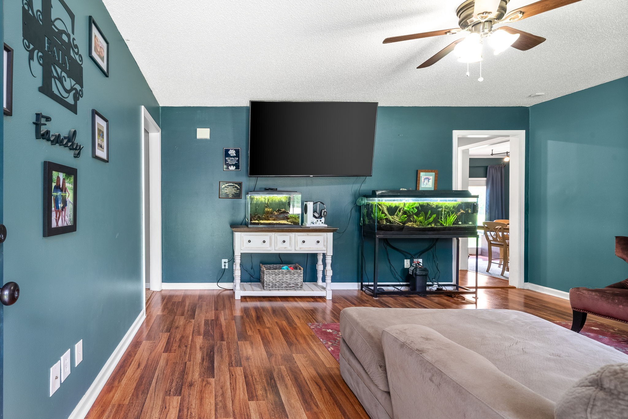 1799 Needmore Road Clarksville, TN 37042 - Photo 5 of 27 a living room with furniture and a fireplace