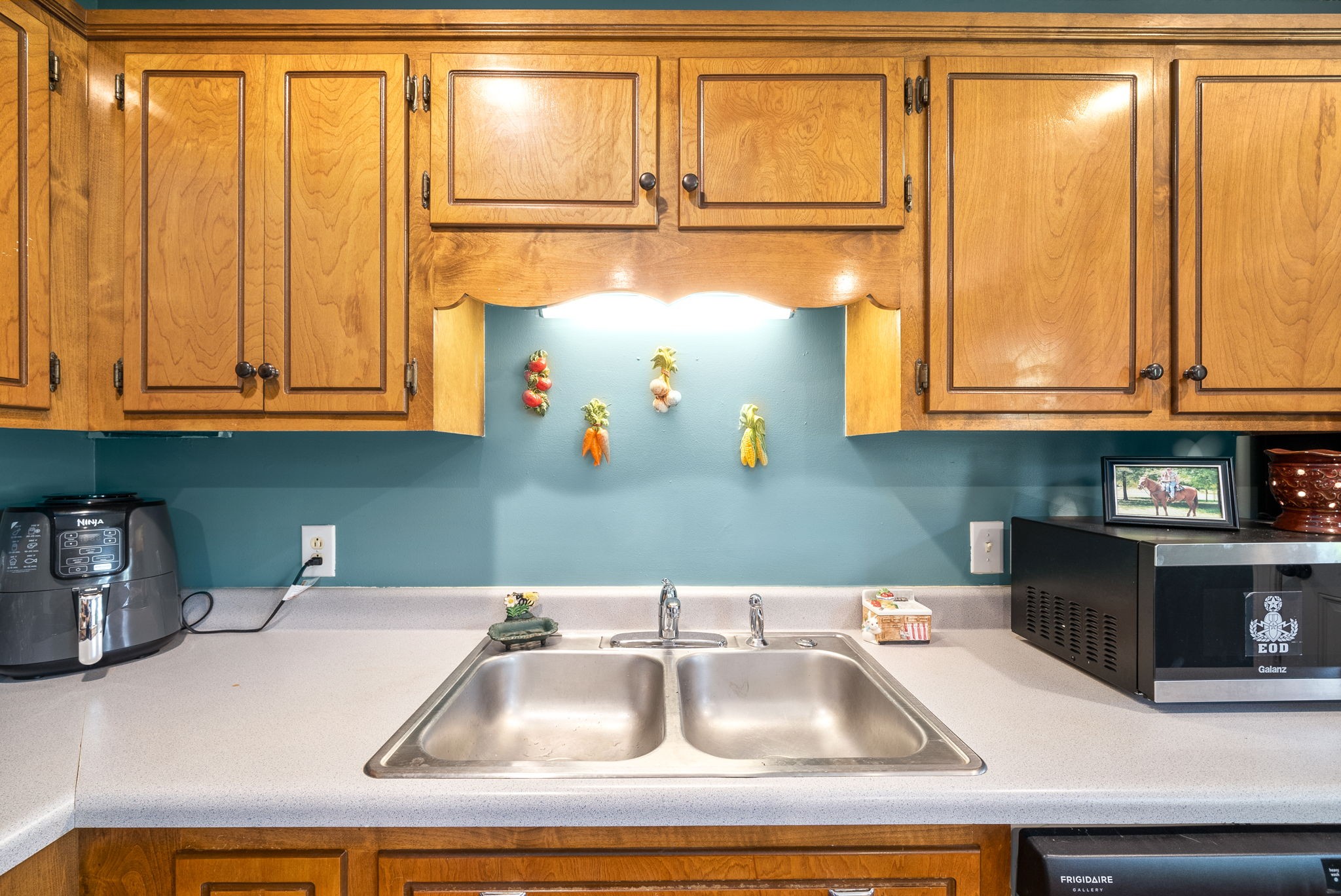 1799 Needmore Road Clarksville, TN 37042 - Photo 10 of 27 a kitchen with granite countertop a sink and a window