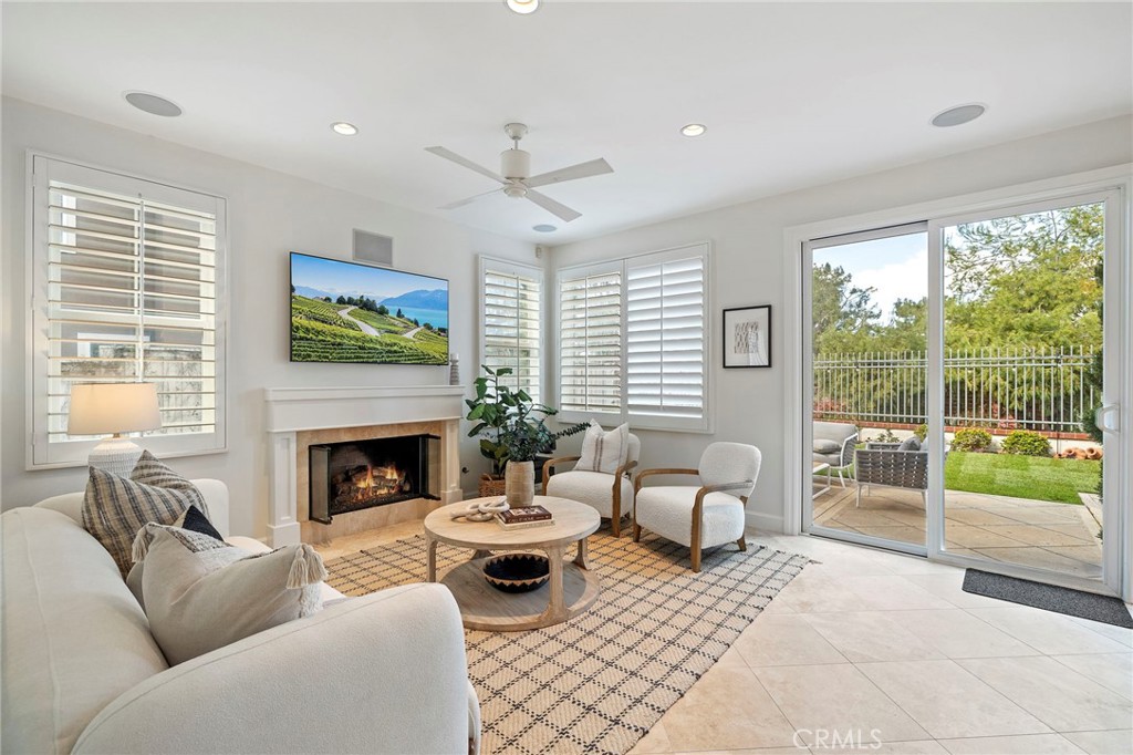 13013 Maxwell Drive Tustin, CA 92782 - Photo 9 of 41 Family Room w/ Sliding Glass Door to Backyard