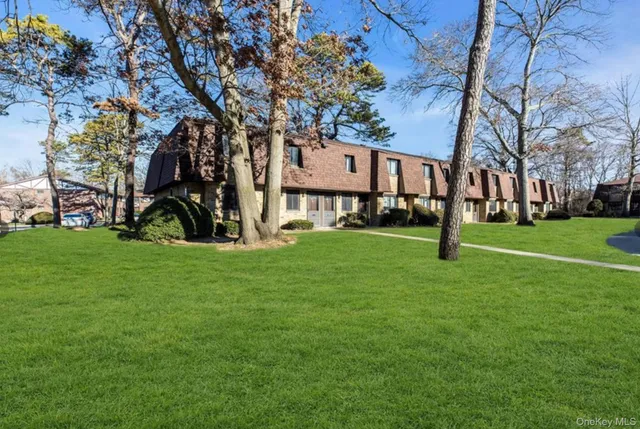 a view of a trees in front of a house